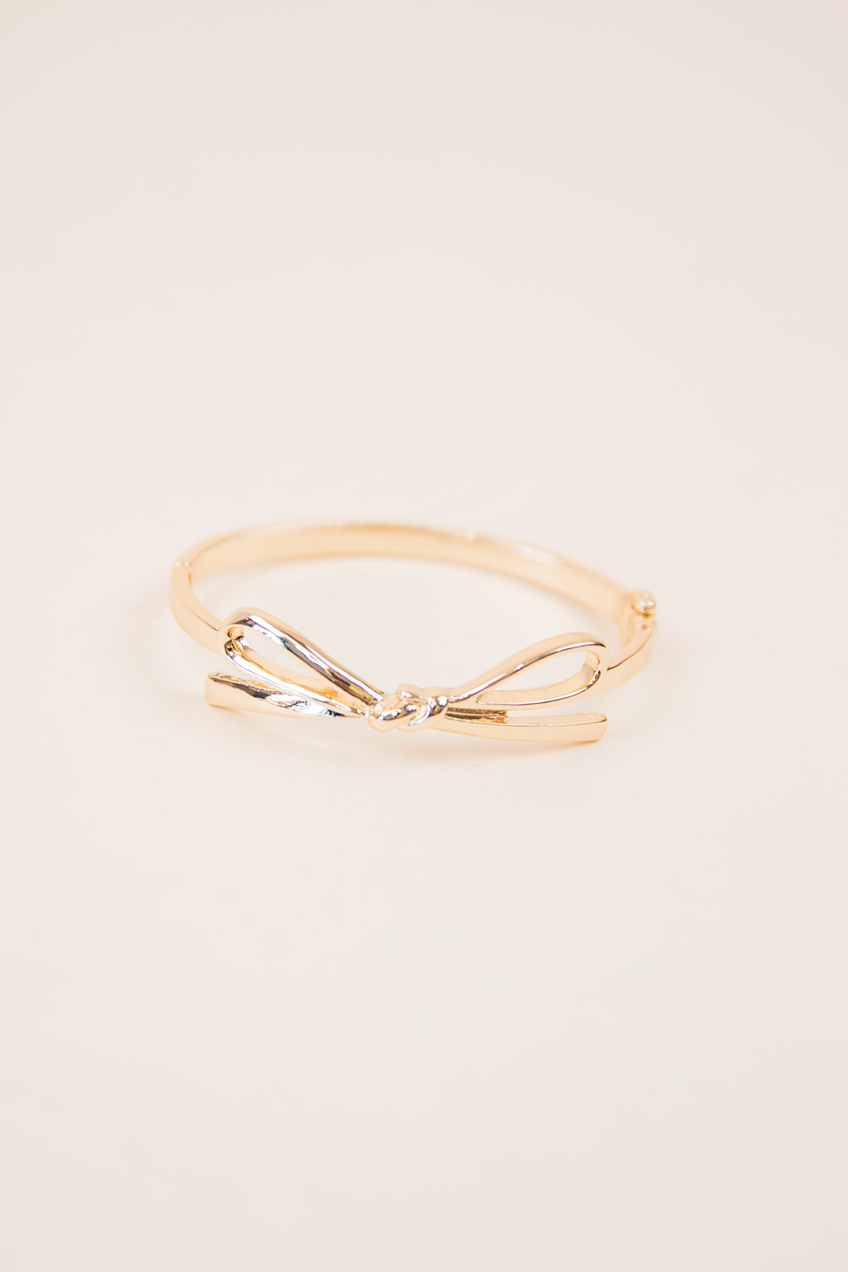 Karina Bow Wrapped Hinge Bangle Shiny Gold